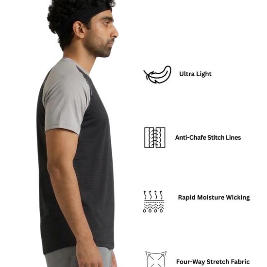 Man wearing a black and gray athletic shirt with feature icons on a white background