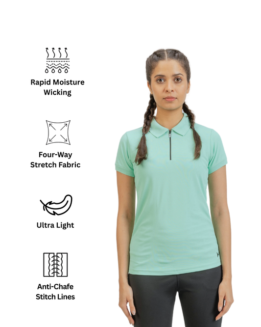 Woman wearing a light green polo shirt with text and icons on a white background