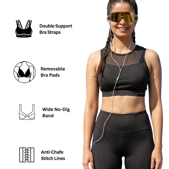 Woman wearing a black sports bra and leggings with product features highlighted on a white background