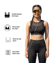 Woman wearing a black sports bra and leggings with product features highlighted on a white background