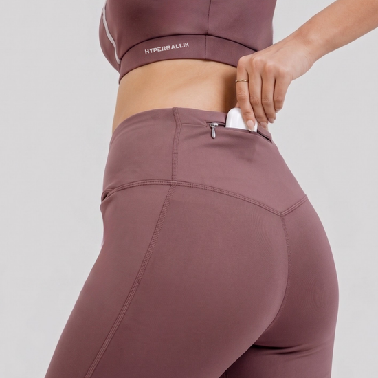 Women’s wine activewear tights back view