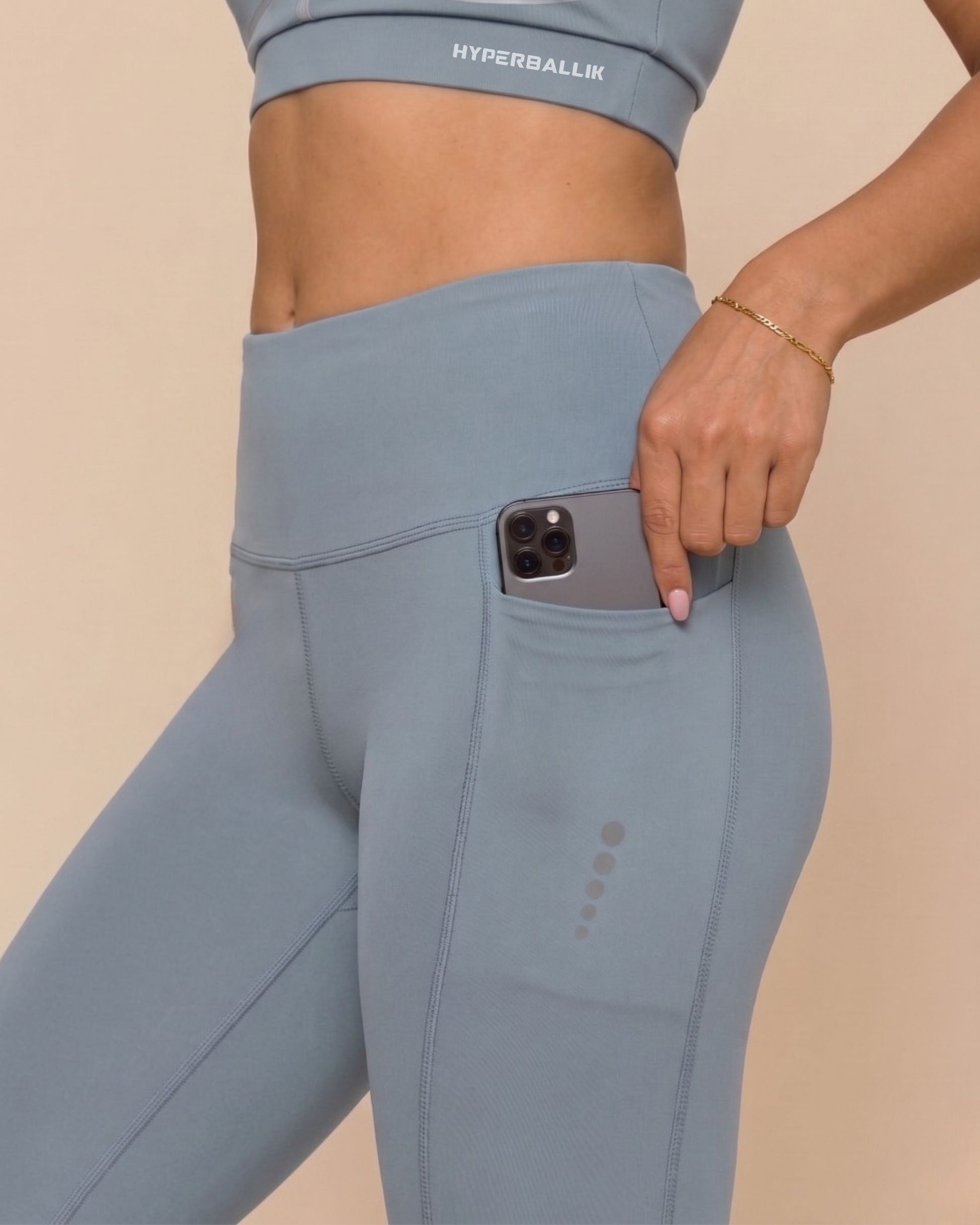 Petrol blue gym half tights side view for women