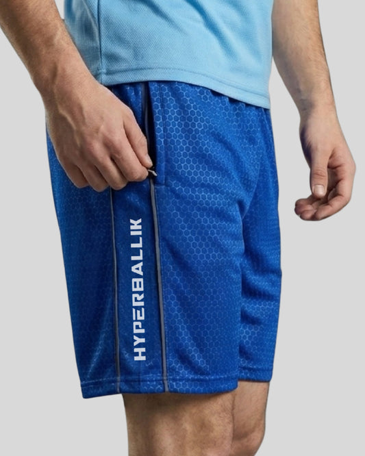 Blue athletic shorts with 'HYPERBALLIK' branding on a gray background