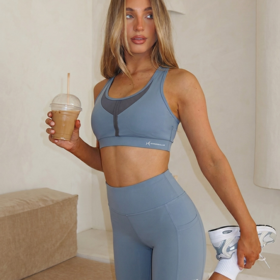 Women’s gym sports bra side view petrol blue