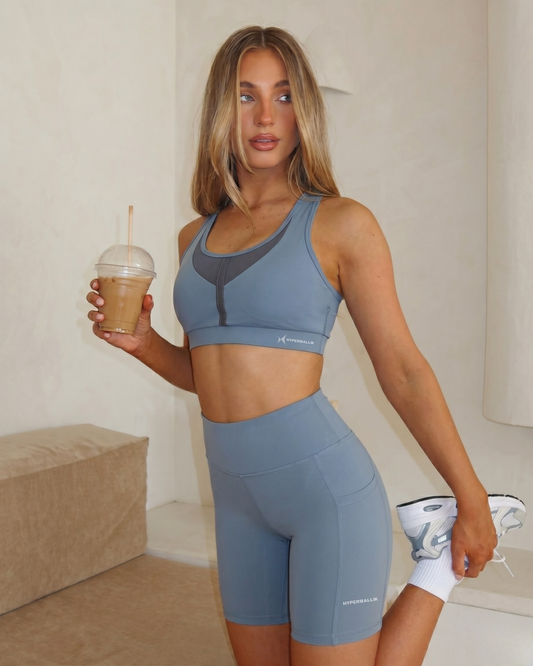 Women’s gym sports bra side view petrol blue