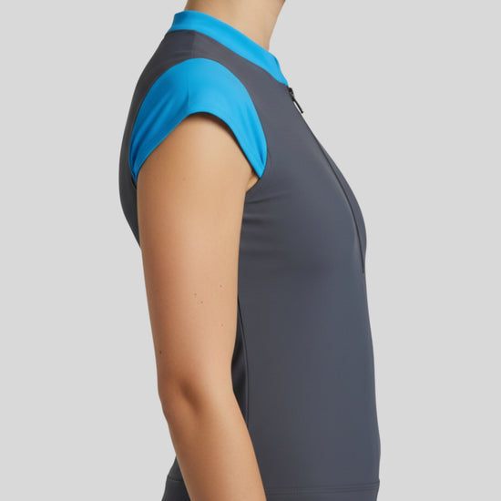 Gray athletic dress with blue sleeves on a plain background