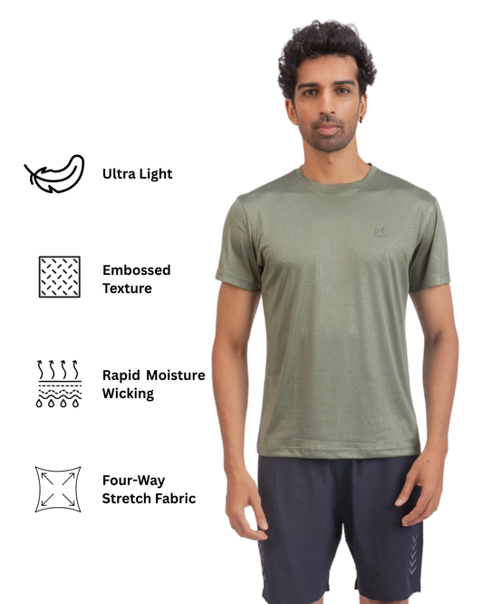 Man wearing a green athletic shirt with feature icons on a white background