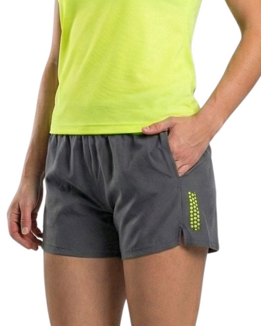 Person wearing gray shorts with a green accent on a white background