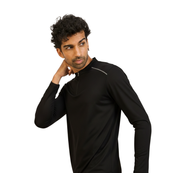 Man wearing a black long-sleeve shirt on a white background