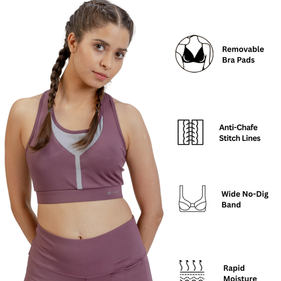 Woman wearing a purple sports bra and leggings with product features listed on the right.