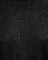 Black textured fabric with geometric pattern