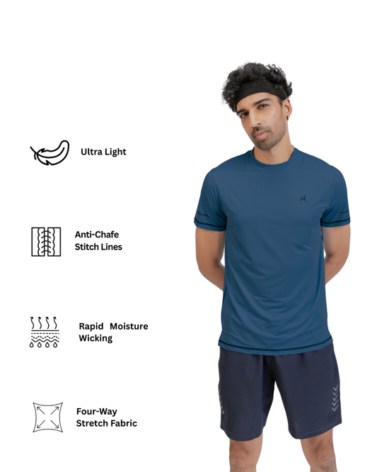 Man wearing a blue athletic shirt and shorts with feature icons on a white background