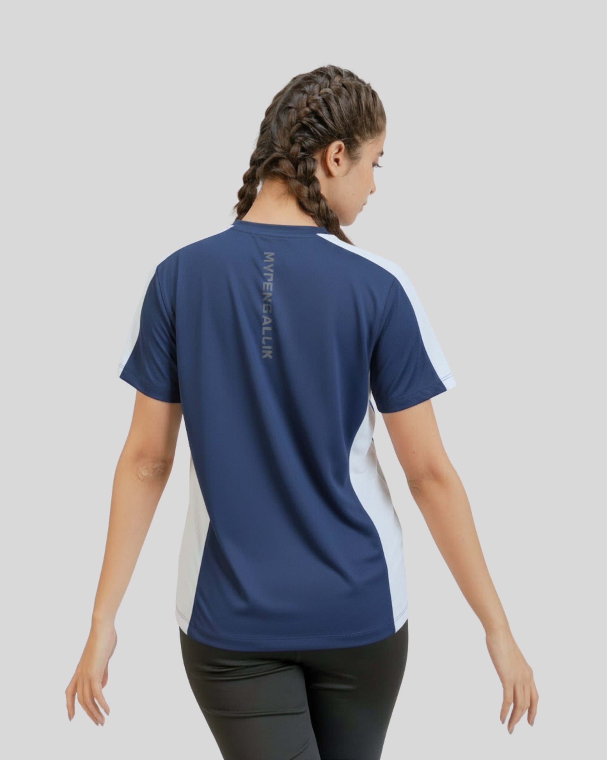 Person wearing a blue and white sports shirt with text on the back against a plain background