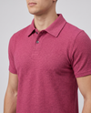 Close-up of the collar and placket on a wine textured bubble-knit polo shirt
